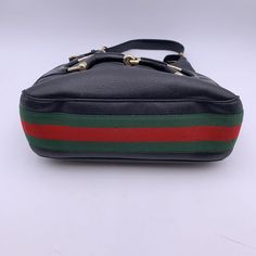 Beautiful Gucci 'Heritage' Hobo Bag, Crafted In Black Leather With Gold Metal Horsebit Detailing On The Frontgreen/Red/Green Stripes Around The Bag.Upper Zipper Closure.Black Fabric Lining With 1 Side Zip Pocket.'Gucci - Made In Italy ' Tag Inside And Serial Number Engraved On The Reverse Of The Tag.Condition B - Very Good Gently Used.Some Wear Of Use On Bottom Corners.A Couple Of Small Black Marks On The Canvas Stripes.Please Check The Photos Carefully And Ask If You Need To Know More Details Or If You Have Any Doubts.Details Material: Leather Color: Black Model: Heritage Gender: Women Country Of Manufacture: Italy Size: Medium Fabric Type: Leather Material Processing: N.A.Material Effect: N.A.All Applique: Metal Applications Handle Style: Shoulder Strap Design: Solid Colour Bags Handles: Gucci Gucci, Dior Shoes, Gucci Black, Chanel Handbags, Green Stripes, Birkin Bag, Gucci Jackie Bag, Hobo Bag, Dior Saddle Bag