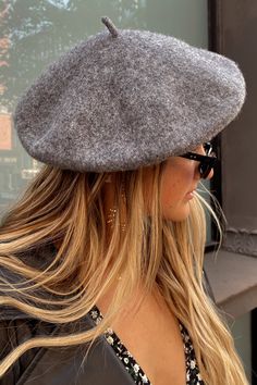 Oui Oui, the Emille Grey Beret is a must! Style this wool beret with a floral dress and booties to fulfill your Parisian fantasies. **ALL ACCESSORIES ARE FINAL SALE** PRODUCT DESCRIPTION: - grey beret - flexible, flat fit - approximately 11" across - 57cm - one size MATERIALS AND CARE INSTRUCTIONS: - 100% wool - spot clean Return Policy: We offer refunds & exchanges within 15 days of delivery with tags attached & in original, unworn conditions (restrictions apply). Final sale items include: jewe Winter Wool Beret With Short Brim, Classic Gray Beret For Winter, Casual Gray Flat Cap Beret, Elegant Wool Beret Cap, Grey Beret, Fall Bottoms, Concert Top, Party Bottoms, Black Beret