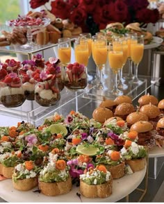 an assortment of appetizers and desserts on display