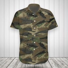 Custom Name Brush Stroke Camouflage Shirts These shirts are custom-made-to-order and handcrafted to the highest quality standards. Each shirt is constructed from a premium polyester blend that is ultra-soft and incredibly comfortable. Features a specialty high definition heat-dye application that ensures long lasting color vibrancy even after machine washing. Fabric is durable and resistant to wrinkles, shrinking and mildew. Each shirt is custom printed, cut and sewn just for you when you place Camouflage Short Sleeve Tops With Sublimation Print, Casual Camouflage Shirt For Outdoor, Military Short Sleeve Outdoor Shirt, Military Short Sleeve Shirt For Outdoor, Military Style Camouflage Cotton Shirt, Military Style Short Sleeve Outdoor Shirt, Outdoor Military Short Sleeve Shirt, Camouflage Cotton Shirt For Outdoor, Outdoor Camouflage Cotton Shirt