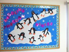 a bulletin board with penguins on it