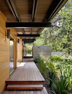 a wooden porch with steps leading up to it