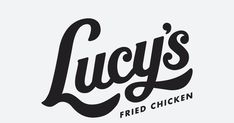 the logo for lucky's fried chicken, which is now on sale in stores