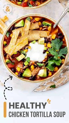 two bowls filled with chicken tortilla soup