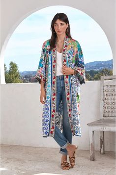 Johnny Was Cozumel Eliza Kimono Reversible Red Flowers Silk Blue Floral Coat New A symphony of color and pattern, the Cozumel Eliza Reversible Kimono is the epitome of timeless elegance. This kimono is designed from lustrous silk and boasts an open front, a reversible side, wide long sleeves, and a medley of richly colored floral patterns complete with red flowers along the edges. Style as outerwear or pair with leisurewear for a chic downtime look. Sizes Available: M, L, XL, XXL Product Details Kimono Online, Boho Womens Clothing, Modern Kimono, Kimono Outfit, Floral Coat, Kimono Coat, Casual Kimono, Boho Hippie Chic, Boho Chic Outfits