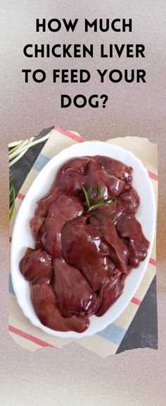 a white bowl filled with meat on top of a table next to a knife and fork