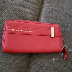 Reaction Kenneth Cole Womens Red Man Made Zip Around Wallet. Has Zippered Change Slot, Bill Slots And Credit Card Slots. Brand New Without Tag. 100% Authentic Trendy Red Wallet With Zipper Closure, Chic Red Wallet For Everyday Use, Chic Red Everyday Wallet, Casual Red Travel Wallet, Super Glow, Womens Wallet, Brown Wallet, Pocket Wallet, Genuine Leather Wallets