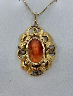 Antique Carved Yellow Gold Necklaces, Elegant Carved Orange Jewelry, Elegant Orange Carved Jewelry, Elegant Orange Ceremonial Jewelry, Antique Carved Necklaces For Formal Occasions, Cameo Pendant Necklace, Red Orange Color, Antique Jewelry Necklace, Cameo Pendant