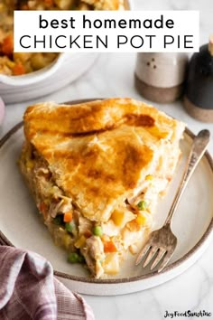 the best homemade chicken pot pie is on a plate with a fork and bowl in the background