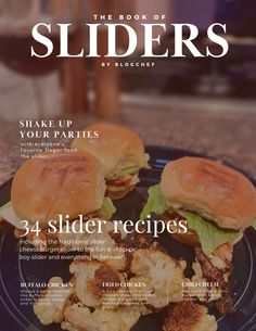 the book of sliders by bloomer is shown on a plate with two sandwiches