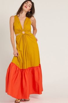 Colorblock maxi dress with waist o ring and side cutouts. Spring Vacation Maxi Dress With Cut-out Waist, Summer Maxi Dress With Cut-out Waist, Chic Cut-out Waist Maxi Dress For Vacation, Color Block Maxi Dress For Vacation, Chic Color Block Maxi Dress For Vacation, Vacation Color Block Maxi Dress, Cutout Sundress Maxi Dress, Sundress Style Maxi Dress With Cutout, Orange Cutout Dress For Summer