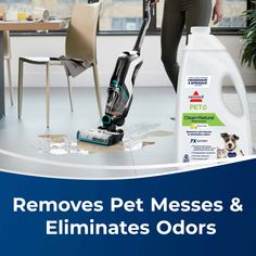 a woman is cleaning the floor with a carpet cleaner and a bottle of pet messes