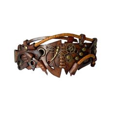 This vintage brown steampunk leather bracelet with a metal dragonfly can be a perfect jewelry gift for men or women. The bracelet is totally handcrafted and carved by hand. That's why it is really a unique piece of art. Each cuff in my shop is made of genuine leather and decorated with metal parts. Bracelet's width is about 2.2 in (5.5 cm) Bracelet's length is about 7.9 in (20 cm) It is adjustable and fits the wrist 6.7-7.9 in (17-20 cm) Please measure your wrist to make the correct choice  IMPORTANT - since it's a handmade item there might be slight variations in the design, however, the general idea and impression will be preserved. CARE No special care is required. Avoid chemical exposure including perfumery. If you need a custom order please let me know and I will try to do my best to Adjustable Steampunk Leather Bracelet, Handmade Steampunk Bracelets As Gift, Handmade Steampunk Bracelets For Gift, Steampunk Brown Jewelry For Gifts, Steampunk Brown Jewelry Gift, Steampunk Brown Jewelry For Gift, Brown Steampunk Jewelry Gift, Adjustable Brown Metal Cuff Bracelet, Bohemian Brown Metal Cuff Bracelet