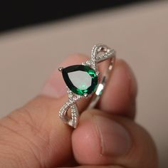 This is a gorgeous handmade creation. Its beauty is its simplicity & Elegance. The 7*9mm pear cut lab emerald crafted in sterling silver and with rhodium plated All item is sent in a beautiful gift box You can realize more lovely stuff clicking the link https://www.etsy.com/shop/knightjewelry?refshopsection_shophome_leftnav Please leave the correct address and you phone number for delivering successfully. Quinceanera Rings, Fantasy Wolves, Juelz Santana, Engament Rings, Gemstone Solitaire Ring, Infinity Engagement Ring, Smaragd Ring, Pink Engagement Ring, Green Gemstone Ring