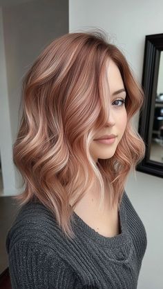 Glow with elegance using rose gold balayage for a romantic and trendy look! This enchanting blend of soft pink and warm blonde adds a whimsical touch to your hair. Click the pin for more balayage inspiration and follow us for the latest hair color trends! #RoseGoldBalayage #BalayageHair #HairColorIdeas #HairInspo #TrendyHair Balayage Rose Gold Blonde, Winter Hair Color For Fair Skin, Medium Hair Color Ideas For Brunettes, Brown Hair With Rose Gold Highlights, Rose Blonde Hair Color, Pink Blonde Hair Rose Gold, Copper Rose Gold Hair Balayage, Champagne Blonde Hair Rose Gold, Peach Hair Color Rose Gold