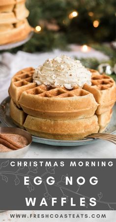 christmas morning egg nog waffles on a plate with cinnamon sticks and whipped cream