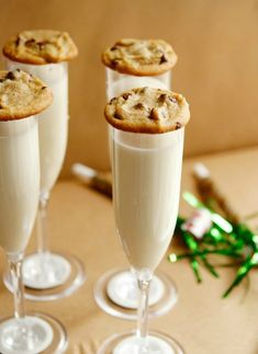 three glasses filled with cookies on top of each other