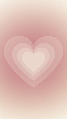 a heart shaped object on a pink background