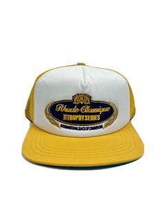 RHUDE TROPHY SERIES EMBROIDERED LOGO YELLOW TRUCKER CAP ONE-SIZE This product data sheet is originally written in English. RHUDE TROPHY SERIES EMBROIDERED LOGO YELLOW TRUCKER CAP ONE-SIZE ALL PRICES ARE FIRM. WE DO NOT RESPOND TO MESSAGES REGARDING OFFERS THANK YOU. DHL EXPRESS INTERNATIONAL IS AVAILABLE ON REQUEST FOR ADDITIONAL COST. Otherwise we use Royal Mail Signed for services or Parcel Force (GMS) for international services. WE HAVE DIFFERENT DESIGNER ITEMS LISTED IN OUR EBAY SHOP. PLEASE Vintage White Trucker Hat With Embroidered Logo, Vintage Yellow Snapback Trucker Hat, Vintage Yellow Snapback Baseball Cap, Vintage Yellow Baseball Cap Trucker Hat, Vintage Yellow Trucker Baseball Cap, Retro Yellow Trucker Hat With Curved Brim, Vintage Yellow Trucker Hat, Yellow Vintage Trucker Hat, Retro Yellow Curved Brim Trucker Hat