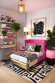 a pink bed with black and white decor