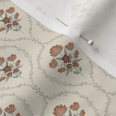 a close up view of the fabric with flowers on it