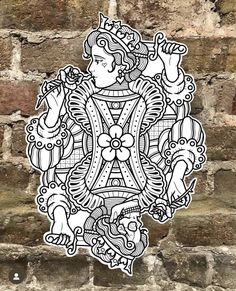 an intricately designed sticker on the side of a brick wall