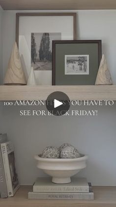 a shelf with books and pictures on top of it that says, 100 amazon gift you have to see for black friday