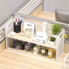 a shelf with various office supplies on it