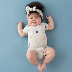 Our bamboo bodysuits are an essential piece for every mini wardrobe. Silky smooth and perfectly stretchy, these bodysuits work as both a standalone outfit or coordinating piece with any other Kyte Baby product. 97% Rayon made from Bamboo, 3% Spandex Breathable material Designed for sensitive skin Snap closures Playful Short Sleeve Bodysuit For Spring Playtime, Cotton Stretch Bodysuit For Playtime, Cute Stretch Bodysuit For Playwear, Casual Fitted Short Sleeve Bodysuit For Playtime, Playful Stretch Cotton Bodysuit, Playful Fitted Short Sleeve Bodysuit For Summer, Spring Playtime Fitted Onesie, Fitted Cotton Bodysuit For Playwear, Stretch Bodysuit For Playwear