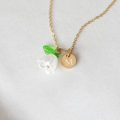 Introducing our personalized Lily Necklace, a perfect blend of elegance and symbolism. This beautiful necklace features a lightweight lily charm with a tiny pearl inside, adding a touch of sophistication to any outfit. The chain is exceptionally durable and won't tarnish, ensuring long-lasting wear. D E T A I L S ✦ Pendant Size: 1.4 cm (width) x 1.1 cm (height) ✦ Necklace Length: 45 cm adjustable to 50 cm ✦ Optional engraved disc 0.8 cm ✦ Material: High-quality, tarnish-resistant chain and light Pearl Gold Necklace, Gold Necklace Dainty, Lily Necklace, White Lily, Mothers Day Special, Gold Pearl Necklace, White Lilies, Summer Necklace, Necklace Dainty