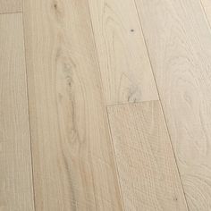 an image of white wood flooring that looks like it has been cleaned and polished