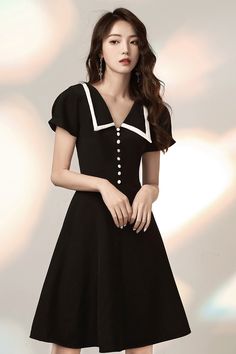 Name:Black evening dress, short sleeve birthday dressMaterial:blendedColor:as picture or custom colorNeckline:lapel neckBack details:zipperDress type:A-lineFeatures:daily dress,party dress&ltp&gtThis dress could be custom made, there are no extra cost to do custom size and color.</p>&ltbr/>&ltp&gt1, If the color is customized, please note the color & card number.</p>&ltbr/>&ltp&gt2,You can choose standard size or custom size . If dress is cus Black Fitted Short Sleeve Party Dress, Fitted Black Short Sleeve Party Dress, Retro Short Sleeve Evening Dresses, Fitted Short Sleeve Midi Dress For Party, Black Retro Dress With Short Sleeves, Black Dress With Bow And Short Sleeves, Elegant Button-up Mini Dress, Elegant Button-up Mini Dress With Covered Buttons, Black Evening Dresses Short