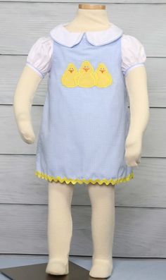 "She will look adorable in a toddler Easter dress by Zuli Kids. Girls Easter dress is blue gingham and is shown with applique chicks that can also come monogrammed. Available with chicks only or with chicks and monogram. *Zuli Kids Premium Quality *65% cotton 35% Poly *Machine Wash Gentle *Girls Easter Dress *Shoulder Button Closures *Available in Size 3 Mo - Size 5 *Special Classic Garment to Commemorate the Special Day *Made in USA WHATS INCLUDED One baby girls Easter dress with applique and m Cute School Sets For Spring, Cute Spring School Sets, Cute Fitted Gingham Sets, Playful Gingham Sets For Spring, Cute Blue School Sets, Fitted Gingham Sets For Spring, Cute Fitted Easter Sets, Cute Sleeveless School Sets, Playful School Sets For Spring