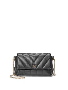 In a stylish quilted finish with VS monogram hardware, this chic and structured bag features a jewelry-like chain strap that goes from shoulder to crossbody with ease. Strap drop: 23” (12” drop when chain is doubled) 9.25" x 3.74" x 5.51" Shoulder-to-crossbody convertible chain strap Double the strap to wear as a shoulder bag Single strap styling wears as a crossbody Magnetic closure Partially made from recycled materials Fits: phone, wallet, keys and everyday essentials Imported Chic Wallet On Chain With Metal Logo For Everyday, Black Quilted Wallet On Chain For Evening, Classic Quilted Evening Wallet On Chain, Classic Quilted Wallet On Chain For Evening, Elegant Quilted Wallet On Chain Crossbody, Chic Quilted Wallet On Chain, Chic Quilted Wallet On Chain For Everyday, Victoria's Secret Crossbody Evening Shoulder Bag, Victoria's Secret Crossbody Evening Bag