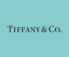 tiffany & co logo on a blue background with the word tiffany and co below it