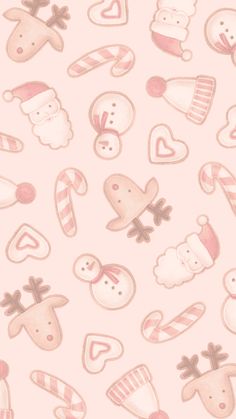 a pink wallpaper with christmas decorations and candy canes on the bottom right corner