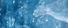 an ice covered window with snow on it