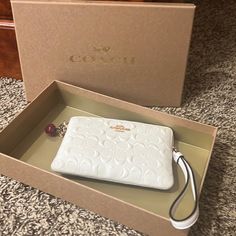 Never Used Has Tags And Originally Boxing White Rectangular Case Bag As A Gift, White Rectangular Case Bag For Gifts, White Rectangular Clutch As Gift, Rectangular White Clutch As Gift, White Rectangular Clutch, White Rectangular Case Clutch For Gift, White Rectangular Case Clutch As Gift, White Rectangular Clutch For Gifts, Coach Clutch Wallets For Gifts