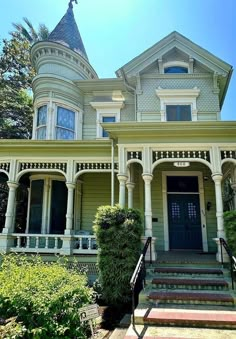 an old victorian style house with many windows and balconies