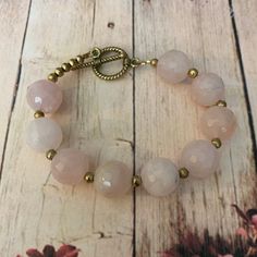 "This is a Faceted 14mm Natural Round Pink Quartz Gemstone Bead Bracelet. I finished it off with a Twisted Rope Gold Tone toggle Clasp. Fits up to 7\"-8\" Wrist. REF: \"Pink Quartz\" Bracelet" Adjustable Beaded Bracelets With Toggle Clasp, Pink Quartz Bracelet, Mookaite Jasper, Gemstone Beaded Bracelets, Custom Earrings, Quartz Bracelet, Pink Quartz, Bracelet Gold, Toggle Clasp