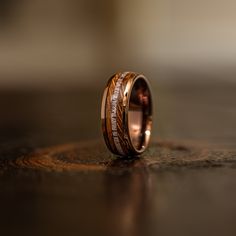 a wedding band with two different designs on it