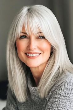 Save this pin for the best medium-length hairstyles for women over 50 with bangs. The sleek, medium length of this lob (long bob) haircut keeps it practical and stylish. The bangs complement the cool-toned shade, giving a refreshing edge to the look. Hair Styles To Try, Women Over 50 With Bangs, Over 50 With Bangs, Hairstyle With Bangs, Medium Length Hairstyle, Hair And Skin Vitamins, Shag Hair, Hair Doo, Haircuts For Medium Length Hair