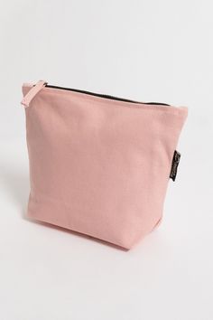 If you’ve been looking for an eco-friendly makeup bag to tame and organize cosmetic items, consider the simple and affordable Lok Pouch. Your purchase also supports Feeding America's campaign to end hunger by helping donate meals to kids and families in need. Size:  7"(H) x 9"(W) x 3"(D) Opening: 7 inches Made with 14-oz Certified Fairtrade Organic cotton canvas Long pull zipper YKK lead-free antique finish metal zippers All the accessories including zippers and fasteners are lead-free Made in a Eco-friendly Cosmetic Bag With Zipper For Daily Use, Eco-friendly Everyday Cosmetic Pouch Bag, Eco-friendly Pouch Cosmetic Bag For Daily Use, Everyday Pink Zipper Pouch For Cosmetics And Toiletries, Everyday Pink Cosmetic Zipper Pouch, Versatile Pink Cosmetic Bag, Versatile Everyday Pink Cosmetic Bag, Versatile Pink Cosmetic Bag For Everyday, Eco Friendly Makeup