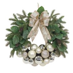 a christmas wreath with silver and white ornaments