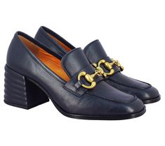 Elevate your shoe collection with these block heel loafers, a chic embodiment of sophistication with eye-catching horse-bit details. Crafted from premium leather for a luxurious feel, these loafers are a testament to timeless elegance, offering a comfortable fit and durability. Perfect for any occasion, they seamlessly blend style and comfort, becoming a versatile addition to your wardrobe. From SaintG. Navy Heels, Heel Loafers, Block Heel Loafers, Mid Heels Pumps, Leather Socks, Block Heel Shoes, Metal Trim, Biker Boots, Orange Leather