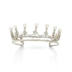 Metal: Sterling Silver Metal Purity: 925 Metal Wt: 980. 00Grams stone: CZ zircon  Stone  Color: white Stone Clarity: AAAAA stone   Cut: Good stone Shape: Round stone  Cut : Brilliant Cut  stone Wt:25 Cwt. Gemstone: pearl Tiara Length: 15 inch Tiara Hight: 2.20 inches Product Color: White Gold Rhodium Plated on Sterling Silver Tiara Collection, Magnificent Jewels, Vintage Tiara, Pearl Tiara, Diamond Tiara, Princess Tiara, Unusual Jewelry, Crown Jewels, Natural Pearl