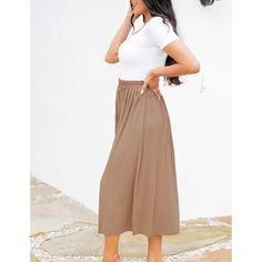 Khaki Elastic Waist Pleated Button Midi Skirt Casual Buttoned Maxi Skirt For Day Out, Khaki Long Pleated Skirt, Beige Relaxed Skirt With Button Closure, Brown Solid Color Midi Skirt, Casual Maxi Skirt With Button Closure For Day Out, Khaki Midi Skirt For Spring, Casual Khaki Midi Skirt, Casual Khaki Lined Skirt Bottoms, Khaki Pleated Midi Skirt