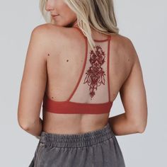 Rust Tattoo Mesh Racerback Bralette Made Of: 92% Nylon & 8% Spandex Size Xs/S Fits 32b, 34a, 34b Size M/L Fits 34b, 36a, 36b Our Boutique Is Filled With A Curated Collection Of Styles: Spell Gypsy Boho Bohemian Hippie Retro Vintage Handmade Coachella Festival Free People Anthropologie Johnny Was Urban Outfitters Western Aztec Tribal Floral Vacation Fall Winter Spring Summer Casual Mumu Cocktail Love Lemons Coat Jeans Pants Top Dresses Shirts Cocktail Party Romantic Date Night Casual Women's Miss Backless Crop Top For Yoga, Seamless Fitted Racerback Bra, Fitted Racerback Crop Top With Mesh Back, Fitted Mesh Back Racerback Crop Top, Stretch T-back Halter Top For Festival, Stretch Backless Halter Top For Yoga, Bra Friendly Racerback Halter Top For Yoga, Bra-friendly Racerback Halter Top For Yoga, Racerback Halter Top For Yoga, Bra-friendly