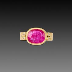 A juicy, rose cut ruby is wrapped in warm 18k gold, and accented with sparkling diamond trios set on the 5mm hammered band. This ring stacks beautifully with other bands in our collection, and would make a stunning engagement ring! Center setting measures approximately 1/2 inch x 5/8 inch. Matte finish. Gold Rings With Rose Cut Diamonds And Pink Sapphire, Oval Ruby Rings With Single Cut Diamonds, Yellow Gold Pink Sapphire Rings With Single Cut Diamonds, Ring Stacks, Hammered Band, Stunning Engagement Ring, Sparkling Diamond, Ruby Ring, Sparkle Diamonds