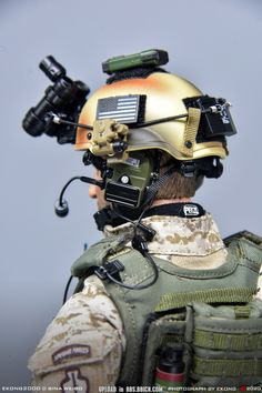 a soldier with a helmet and goggles on